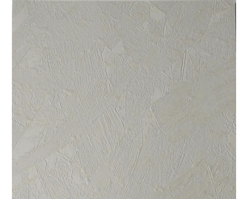 Strukturovaná tapeta se vzhledem omítky a nepravidelnou povrchovou strukturou.