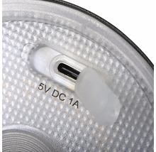 Nabíjecí port USB-C se silikonovým ochranným krytem a označením 5 Volt stejnosměrný proud 1 Ampér.