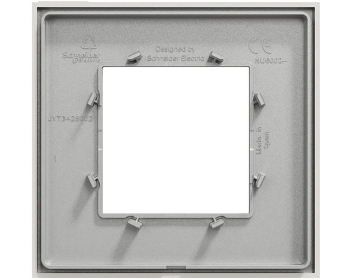 Zadní pohled na krycí rámeček Schneider Electric 1násobný s upevňovacími svorkami a Schneider Electric Logo.