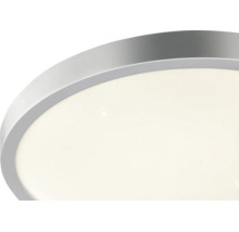 LED stropní svítidlo s kulatým kovovým rámem a hvězdným efektem.