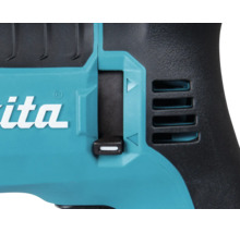 Detailní pohled na elektrické nářadí Makita s přepínačem směru otáčení a Makita Logo.