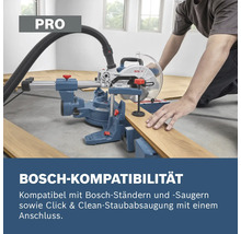 Pokosová pila Bosch při řezání dřevěných prken s připojeným odsáváním prachu pro ukázku kompatibility.