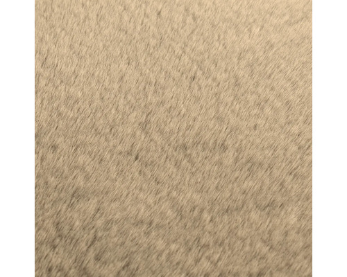 Detailní záběr na texturu měkké umělé kožešiny pro koberce nebo textilie.