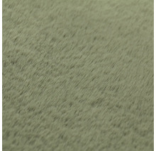 Detailní záběr měkkého plyšového povrchu.