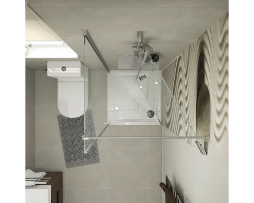 Pohled shora na moderní koupelnu se čtvercovým skleněným sprchovým koutem, závěsným WC a umyvadlem na dlážděné podlaze.