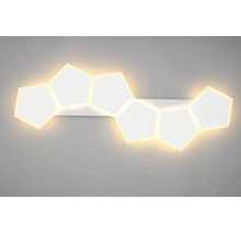 Moderní LED nástěnné svítidlo s geometrickými pětiúhelníkovými světelnými prvky v modulárním uspořádání pro rovnoměrné osvětlení