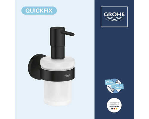 Dávkovač mýdla Grohe QuickFix pro montáž na stěnu s matnou povrchovou úpravou a skleněnou nádobkou, vhodný k lepení nebo vrtání.