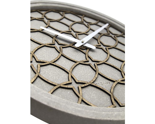 Dekorativní nástěnné hodiny s geometrickým vzorem a ukazatelem času