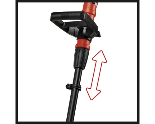 Detailní pohled na vyžínač s nastavitelnou rukojetí a šipkou ukazující nastavení výšky