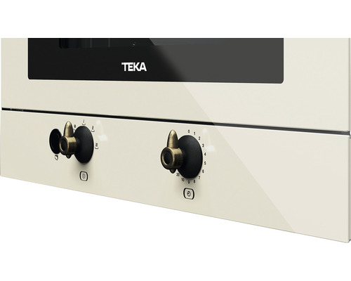 Detailní pohled na troubu Teka s otočnými knoflíky pro nastavení teploty a výběr funkcí.