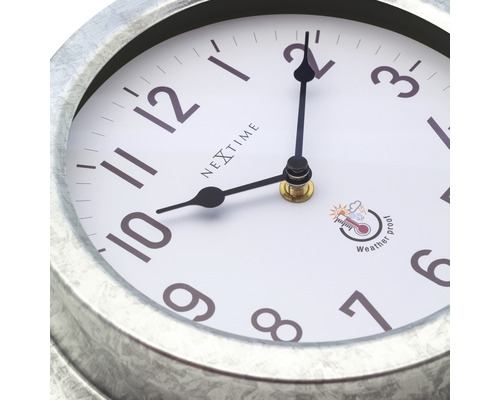 Nástěnné hodiny Nextime s ochranou proti povětrnostním vlivům