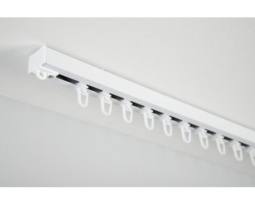 Záclonová kolejnice s kluzáky pro montáž na strop