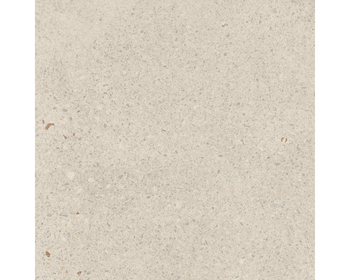 Detail béžové dlaždice s tečkovaným povrchem