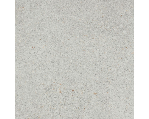 Detail světlé keramické dlaždice s texturovaným povrchem