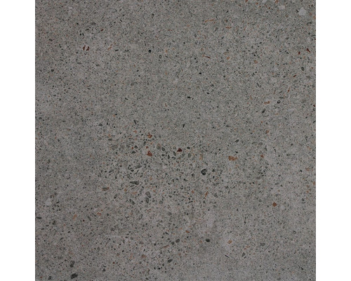 Šedá betonová dlaždice s malými inkluzemi