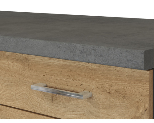 Detailní pohled na skříňku pod umyvadlo se zásuvkou, pracovní deskou a úchytkou