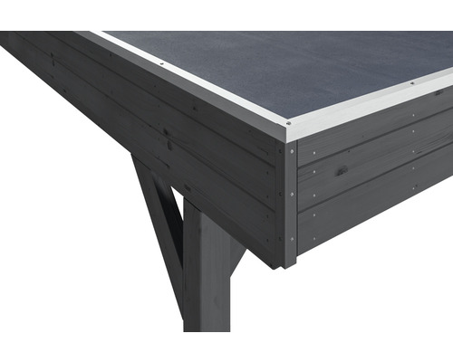 Detail zahradního domku s plochou střechou a dřevěnou konstrukcí