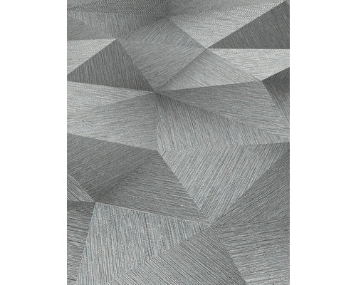 Detail šedé tapety s trojrozměrným geometrickým vzorem.