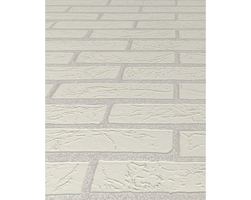 Detail tapety se vzorem cihel.