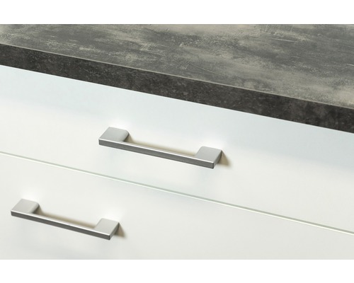 Detail koupelnové skříňky se dvěma zásuvkami, pracovní deskou a úchyty