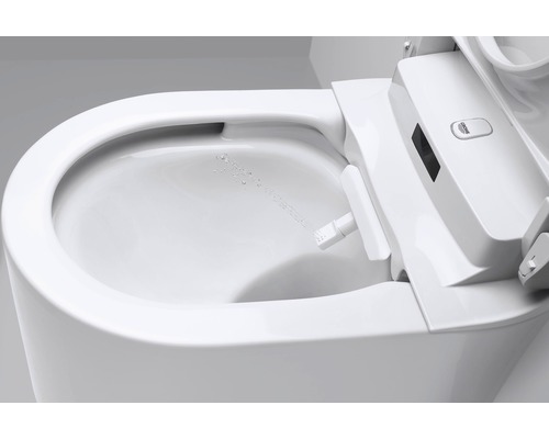 Bílé sprchové WC s proudem vody