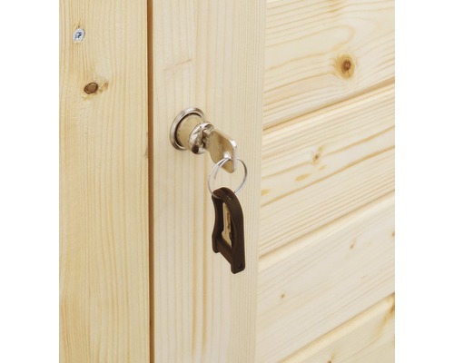 Klíč v zámku dřevěných dveří