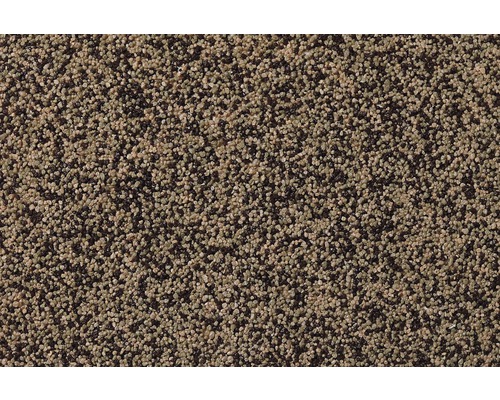 Detailní záběr omítkové struktury s malými zrníčky