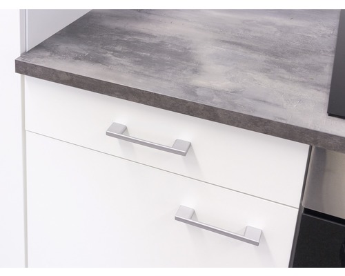 Kuchyňská spodní skříňka s šedou pracovní deskou a zásuvkami