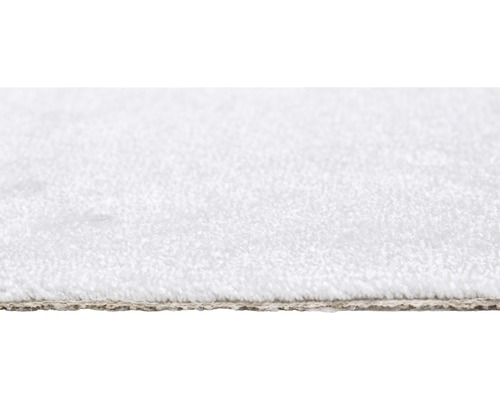 Detail bílého koberce s vlasem