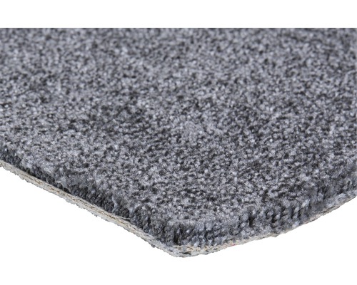 Detail šedého koberce