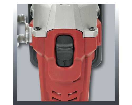 Detailní záběr úhlové brusky s vypínačem