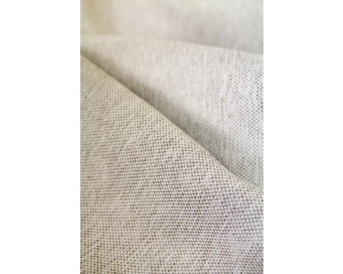 Detail béžové látky s tkanou strukturou