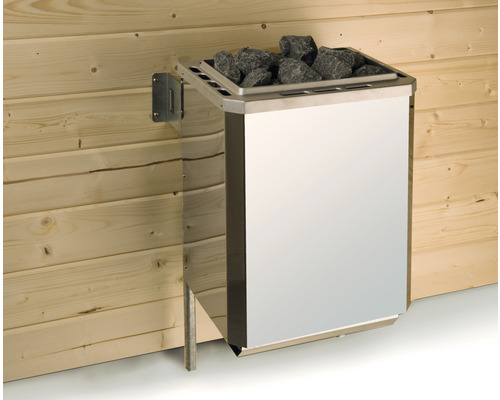 Kovová kamna do sauny se saunovými kameny na dřevěné stěně