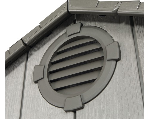 Detail zahradního domku s kulatým větracím otvorem