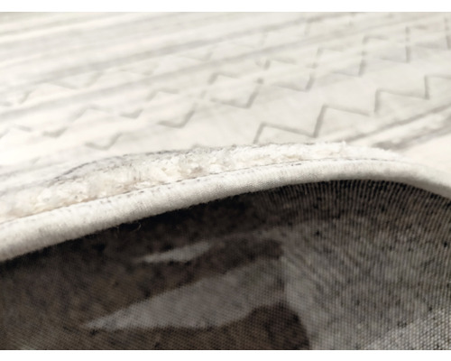 Detailní pohled na koberec se vzorem