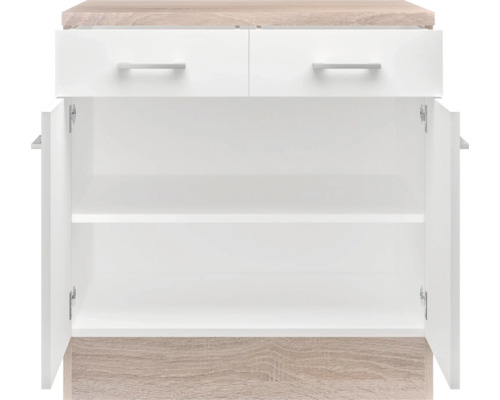 Bílá spodní skříňka se dvěma zásuvkami a otevřenými dvířky.