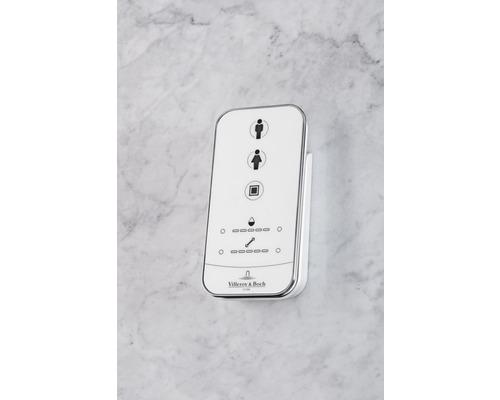 Ovládací prvek WC Villeroy & Boch s piktogramy pro ovládání funkcí splachování.