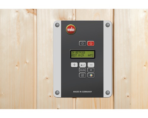 Logo Weka na ovládání sauny na dřevěné stěně