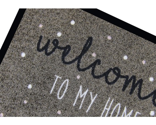 Rohožka s nápisem Vítejte u mě doma