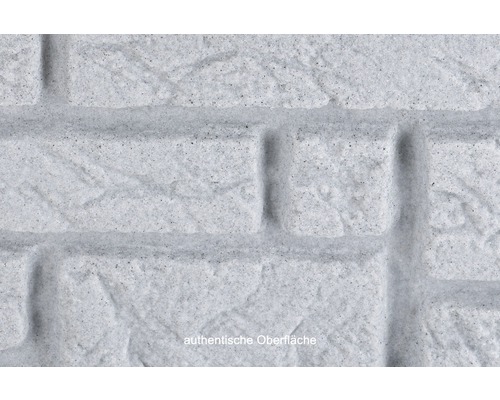 Detailní pohled na obklad stěny zdiva s autentickým povrchem.