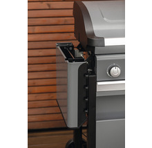 Detailní pohled na šedý plynový gril s bočním stolem