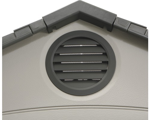 Detail zahradního domku s kulatou větrací mřížkou