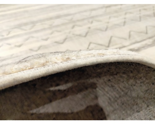 Detail vzorovaného koberce