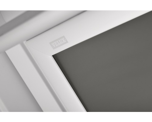 Logo Velux na střešní roletě