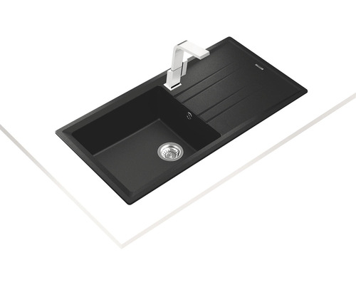 Černý granitový kuchyňský dřez s odkapávací plochou a vodovodní baterií