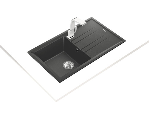 Kamenný dřez s odkapávací plochou a baterií