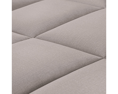 Detail prošívaného textilního povrchu