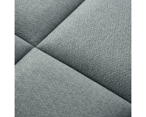 Detail strukturovaného, čalouněného kusu nábytku