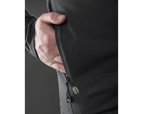 Detailní záběr bundy s kapsou a zipem