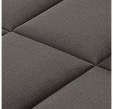 Detail čalouněného nábytku se čtvercovými přihrádkami